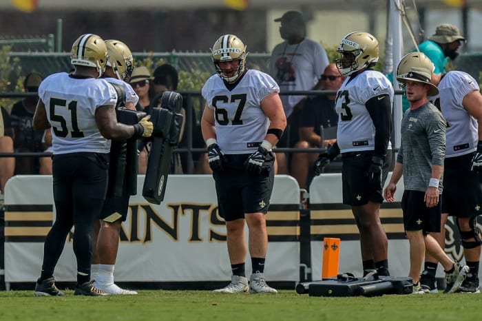 New Orleans Saints offensive tackle Landon Young (67) looks on during a training camp session. Mandatory Credit: Stephen Lew-USA TODAY